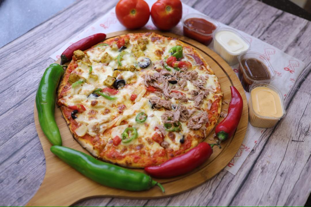 بيتزا الفصول الأربعة